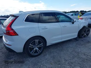 2021 Volvo XC60 Momentum with VIN YV4102DK6M1826828, listed as a IAAI auction lot 40603154 with 58,124 mi miles and . Bid and sale history available at DreamBid. Image 4.
