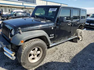 2009 Jeep Wrangler Unlimited X with VIN 1J4GA39199L733727, listed as a Copart auction lot 44046095 with 177,797 mi miles and Salvage Title. Bid and sale history available at carsss.com. Image 1.