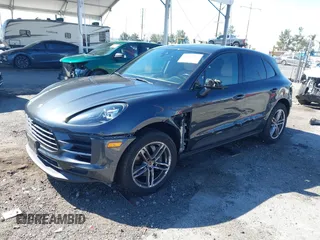 2021 Porsche Macan with VIN WP1AA2A58MLB04780, listed as a IAAI auction lot 41674377 with 55,946 mi miles and . Bid and sale history available at DreamBid. Image 2.