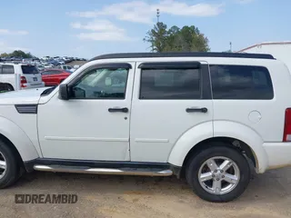 2008 Dodge Nitro SXT with VIN 1D8GU28K18W129119, listed as a IAAI auction lot 41899314 with 244,830 mi miles. Bid and sale history available at carsss.com. Image 15.