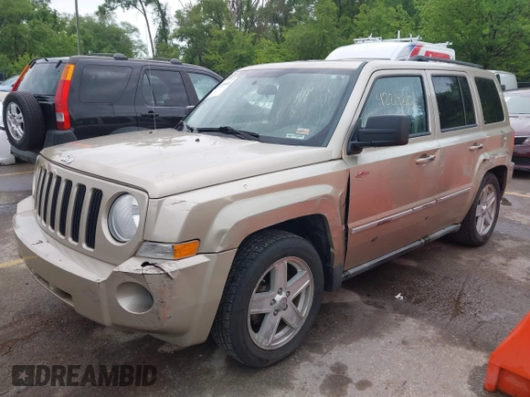 2010 Jeep Patriot Sport with VIN 1J4NF2GB7AD585140, listed as a IAAI auction lot 42219810 with 111,819 mi miles and . Bid and sale history available at carsss.com. Image 2.