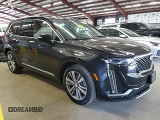 2020 Cadillac XT6 AWD Premium Luxury with VIN 1GYKPDRS1LZ112347, listed as a Copart auction lot 63209315 with 233,485 mi miles and Clean title. Bid and sale history available at DreamBid. Image 4.