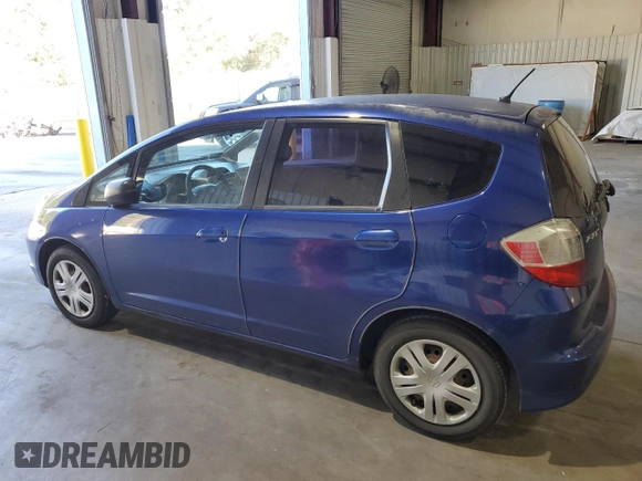 2009 Honda Fit with VIN JHMGE88279S059230, listed as a Copart auction lot 81409304 with 140,991 mi miles and Clean Title. Bid and sale history available at carsss.com. Image 2.
