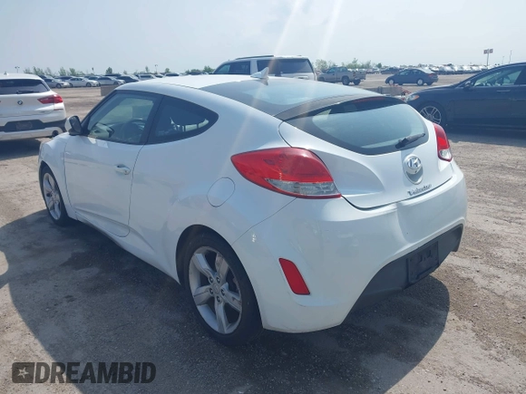 2014 Hyundai Veloster RE:FLEX z VIN KMHTC6AD5EU201168, wystawiony jako IAAI lot #41930766 z przebiegiem 198 909 mil mil oraz . Historia ofert i sprzedaży dostępna na DreamBid. Obrazek 3.