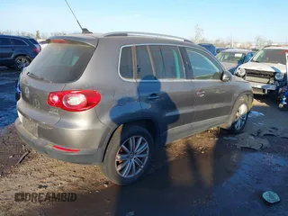 2010 Volkswagen Tiguan SEL with VIN WVGBV7AX0AW000279, listed as a IAAI auction lot 41389452 with 87,258 mi miles and . Bid and sale history available at DreamBid. Image 4.