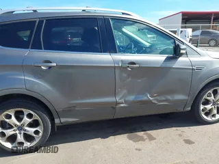 2013 Ford Escape Titanium with VIN 1FMCU0J9XDUC16155, listed as a IAAI auction lot 42373566 with 132,608 mi miles and . Bid and sale history available at DreamBid. Image 6.