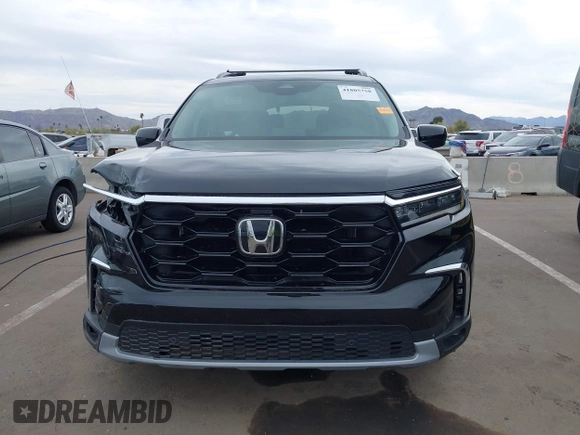 2024 Honda Pilot Touring z VIN 5FNYG1H70RB032368, wystawiony jako IAAI lot #41805758 z przebiegiem 13 078 mil mil oraz . Historia ofert i sprzedaży dostępna na DreamBid. Obrazek 12.