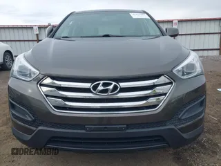 2014 Hyundai Santa Fe z VIN 5XYZTDLB1EG144290, wystawiony jako IAAI lot #42126367 z przebiegiem 138 525 mil mil oraz . Historia ofert i sprzedaży dostępna na DreamBid. Obrazek 6.