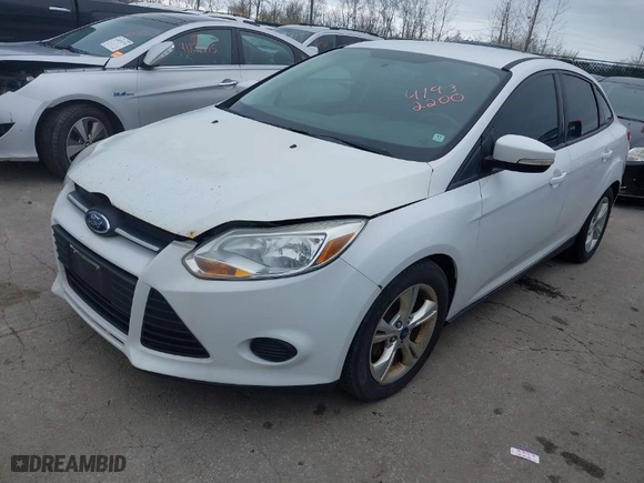 2014 Ford Focus SE with VIN 1FADP3F2XEL388552, listed as a IAAI auction lot 41932200 with 122,744 mi miles. Bid and sale history available at carsss.com. Image 2.