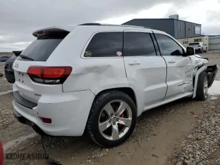 2015 Jeep Grand Cherokee SRT with VIN 1C4RJFDJ8FC919486, listed as a Copart auction lot 76821994 with 114,944 mi miles and Salvage Title. Bid and sale history available at carsss.com. Image 3.