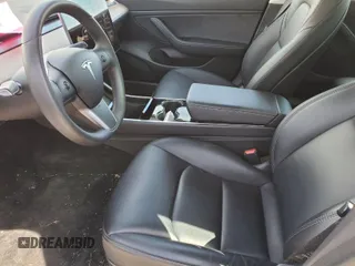 2020 Tesla Model 3 Long Range with VIN 5YJ3E1EB5LF649992, listed as a IAAI auction lot 41976570 with 77,235 mi miles and . Bid and sale history available at DreamBid. Image 1.