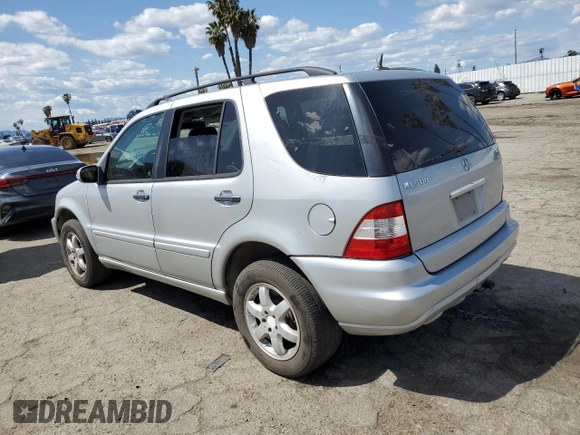 2004 Mercedes-Benz M-Class with VIN 4JGAB75EX4A470494, listed as a Copart auction lot 52024515 with 185,639 mi miles and Salvage Title. Bid and sale history available at carsss.com. Image 2.