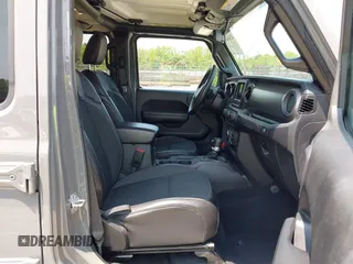 2023 Jeep Wrangler Sport Altitude с VIN 1C4HJXDG6PW576179, выставлен на аукционе IAAI как лот 42345627 с пробегом 20 112 миль миль и . История ставок и продаж доступна на DreamBid. Изображение 5.