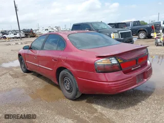 2003 Pontiac Bonneville SE with VIN 1G2HX52K334138157, listed as a IAAI auction lot 41897767 with 216,757 mi miles. Bid and sale history available at carsss.com. Image 3.