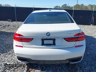 2017 BMW 7 Series 750i with VIN WBA7F0C34HGM21738, listed as a IAAI auction lot 41772933 with 62,923 mi miles and . Bid and sale history available at carsss.com. Image 16.