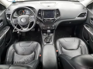 2019 Jeep Cherokee Limited with VIN 1C4PJMDX5KD282058, listed as a Copart auction lot 61359345 with 65,347 mi miles and Salvage title. Bid and sale history available at DreamBid. Image 8.