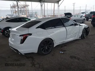 2021 Cadillac CT5 Sport z VIN 1G6DU5RK9M0117981, wystawiony jako IAAI lot #42021432 z przebiegiem 67 363 mil mil oraz . Historia ofert i sprzedaży dostępna na DreamBid. Obrazek 4.