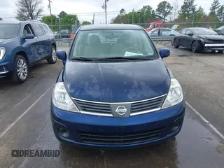 2007 Nissan Versa 1.8 SL with VIN 3N1BC11E67L420474, listed as a IAAI auction lot 41887735 with 199,094 mi miles. Bid and sale history available at carsss.com. Image 12.