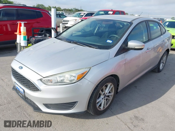 2015 Ford Focus SE with VIN 1FADP3F2XFL340583, listed as a IAAI auction lot 42099224 with 111,970 mi miles. Bid and sale history available at carsss.com. Image 2.