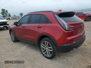 2021 Cadillac XT4 FWD Sport with VIN 1GYFZER49MF082391, listed as a Copart auction lot 56256804 with 24,415 mi miles and Salvage Title. Bid and sale history available at DreamBid. Image 2.