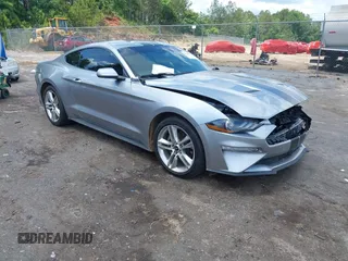2021 Ford Mustang EcoBoost z VIN 1FA6P8TH1M5121107, wystawiony jako IAAI lot #42204097 z przebiegiem 51 542 mil mil oraz . Historia ofert i sprzedaży dostępna na DreamBid. Obrazek 1.