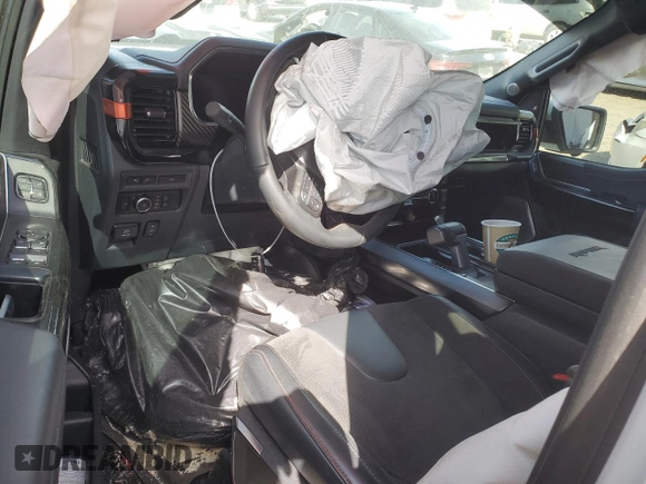 2023 Ford F-150 Raptor with VIN 1FTFW1RJ4PFC98974, listed as a Copart auction lot 47208565 with Not Provided miles and Salvage Title. Bid and sale history available at DreamBid. Image 8.