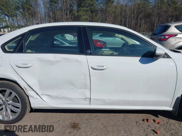 2019 Volkswagen Passat 2.0T Wolfsburg Edition with VIN 1VWLA7A32KC000818, listed as a IAAI auction lot 41711518 with 87,873 mi miles. Bid and sale history available at carsss.com. Image 13.