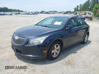 2014 Chevrolet Cruze 1LT with VIN 1G1PC5SB6E7226990, listed as a IAAI auction lot 42490123 with 125,256 mi miles and . Bid and sale history available at DreamBid. Image 2.