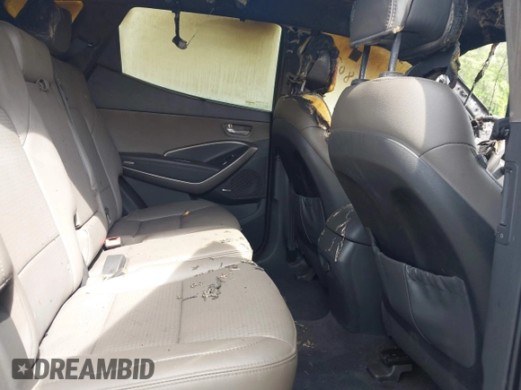 2016 Hyundai Santa Fe z VIN 5XYZU3LB4GG308030, wystawiony jako IAAI lot #42102832 z przebiegiem Nie podano mil oraz . Historia ofert i sprzedaży dostępna na DreamBid. Obrazek 8.