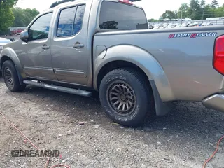 2005 Nissan Frontier LE with VIN 1N6AD07UX5C447844, listed as a IAAI auction lot 42184393 with 202,226 mi miles and . Bid and sale history available at DreamBid. Image 6.