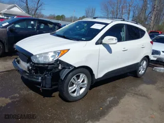 2013 Hyundai Tucson GLS with VIN KM8JU3AC6DU646866, listed as a IAAI auction lot 41846665 with 156,779 mi miles. Bid and sale history available at carsss.com. Image 18.