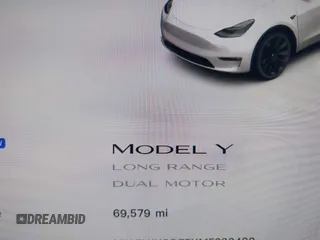 2021 Tesla Model Y Long Range with VIN 5YJYGDEEXMF280480, listed as a IAAI auction lot 41993633 with 69,579 mi miles. Bid and sale history available at carsss.com. Image 16.