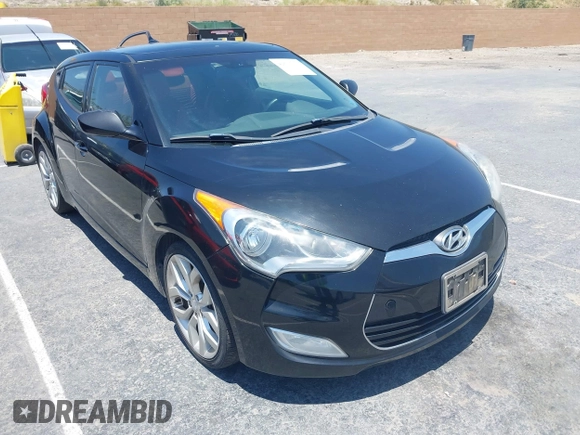 2013 Hyundai Veloster w/Gray Int with VIN KMHTC6AD2DU140750, listed as a IAAI auction lot 42615351 with 191,873 mi miles and . Bid and sale history available at DreamBid. Image 1.
