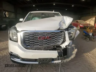 2019 GMC Yukon Denali with VIN 1GKS1CKJ7KR370524, listed as a Copart auction lot 77344394 with 39,753 mi miles and Salvage Title. Bid and sale history available at carsss.com. Image 5.