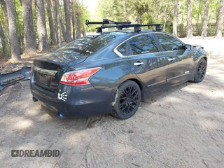 2015 Nissan Altima S with VIN 1N4AL3AP6FN381962, listed as a IAAI auction lot 42031940 with 98,443 mi miles and . Bid and sale history available at DreamBid. Image 4.