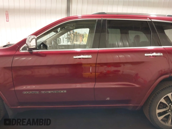 2018 Jeep Grand Cherokee High Altitude with VIN 1C4RJFCG6JC215902, listed as a IAAI auction lot 41866716 with 76,282 mi miles. Bid and sale history available at carsss.com. Image 15.