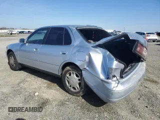 1994 Toyota Camry XLE with VIN JT2GK13EXR0004262, listed as a Copart auction lot 46285135 with 191,548 mi miles and Salvage Title. Bid and sale history available at carsss.com. Image 2.