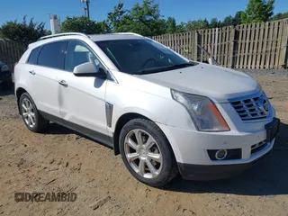2013 Cadillac SRX Performance Collection with VIN 3GYFNHE31DS597987, listed as a IAAI auction lot 42319058 with 139,670 mi miles and . Bid and sale history available at DreamBid. Image 1.