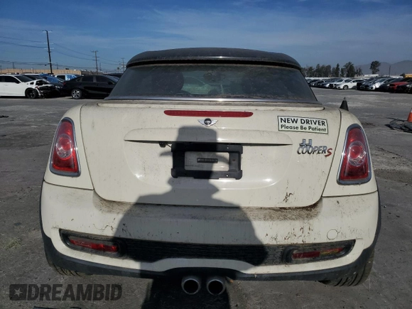 2013 MINI Coupe S z VIN WMWSX3C55DT772606, wystawiony jako Copart lot #43653845 z przebiegiem 39 474 mil mil oraz Czysty tytuł • Clean title. Historia ofert i sprzedaży dostępna na DreamBid. Obrazek 6.