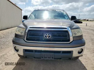 2010 Toyota Tundra with VIN 5TFDW5F12AX123529, listed as a Copart auction lot 60132615 with 264,205 mi miles and Clean title. Bid and sale history available at DreamBid. Image 5.