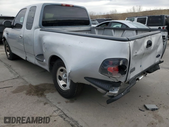 1998 Ford F-150 with VIN 2FTZX0729WCA50004, listed as a Copart auction lot 50028895 with 291,952 mi miles and Salvage title. Bid and sale history available at DreamBid. Image 2.