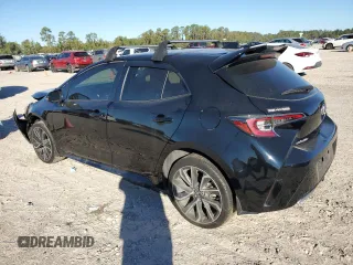 2022 Toyota Corolla Hatchback SE with VIN JTNB4MBE1N3155087, listed as a Copart auction lot 80633534 with 43,279 mi miles and Clean Title. Bid and sale history available at carsss.com. Image 2.