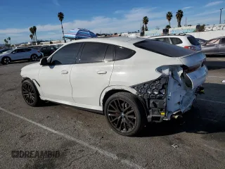 2023 BMW X6 xDrive40i z VIN 5UXCY6C02P9P43834, wystawiony jako Copart lot #85347614 z przebiegiem 16 921 mil mil oraz Szkoda całkowita • Salvage title. Historia ofert i sprzedaży dostępna na DreamBid. Obrazek 2.