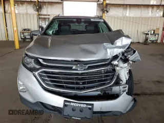 2019 Chevrolet Equinox Premier z VIN 3GNAXYEX3KS592663, wystawiony jako Copart lot #59635385 z przebiegiem 70 575 mil mil oraz Szkoda całkowita • Salvage title. Historia ofert i sprzedaży dostępna na DreamBid. Obrazek 5.