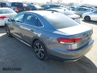 2020 Volkswagen Passat 2.0T SEL with VIN 1VWCA7A30LC025234, listed as a IAAI auction lot 41699506 with 49,117 mi miles. Bid and sale history available at carsss.com. Image 3.
