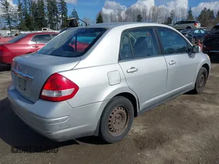 2009 Nissan Versa 1.8 S with VIN 3N1BC11E19L375222, listed as a IAAI auction lot 41736533 with 197,946 mi miles. Bid and sale history available at carsss.com. Image 4.