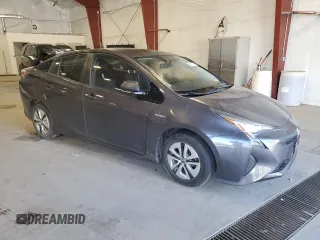2016 Toyota Prius Four z VIN JTDKARFU2G3508628, wystawiony jako Copart lot #54727495 z przebiegiem Nie podano mil oraz Szkoda całkowita • Salvage title. Historia ofert i sprzedaży dostępna na DreamBid. Obrazek 4.