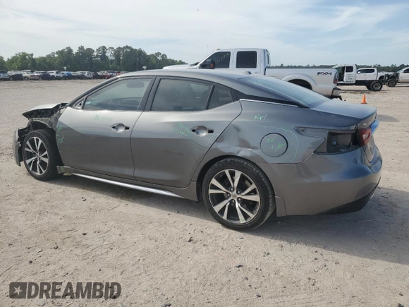 2017 Nissan Maxima SV with VIN 1N4AA6AP8HC433310, listed as a Copart auction lot 56983965 with 101,273 mi miles and Salvage title. Bid and sale history available at DreamBid. Image 2.
