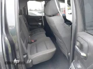 2019 Chevrolet Silverado 1500 LT with VIN 2GCVKPEC3K1181601, listed as a IAAI auction lot 41930872 with 59,106 mi miles and . Bid and sale history available at DreamBid. Image 8.