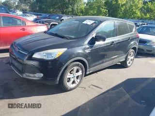2013 Ford Escape SE with VIN 1FMCU9GX5DUB79784, listed as a IAAI auction lot 42733276 with 110,961 mi miles and . Bid and sale history available at DreamBid. Image 2.